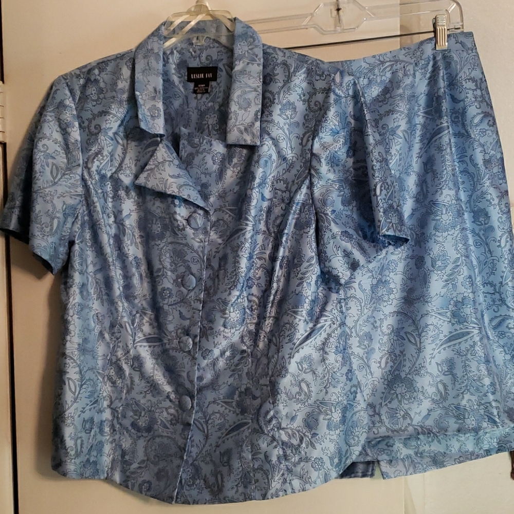 A blue suit jacket and skirt